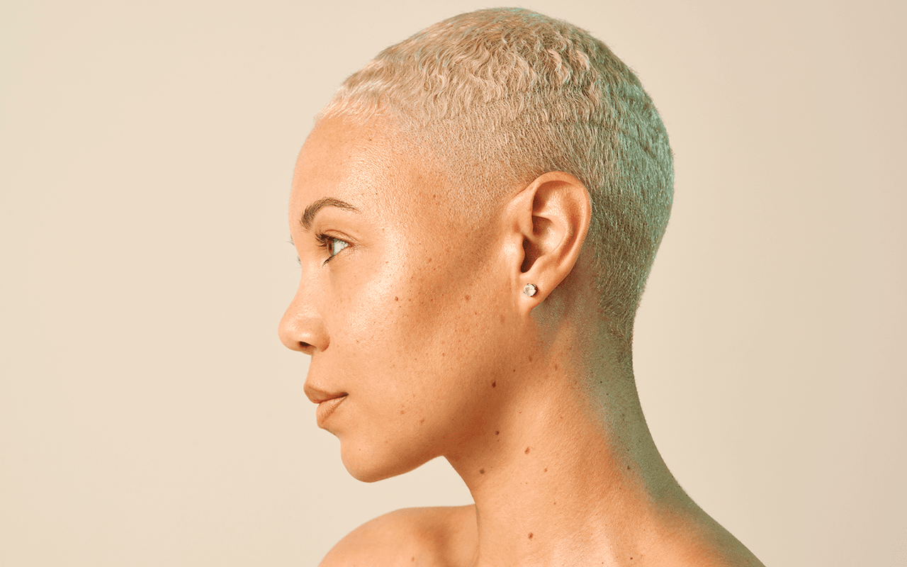 Model looking to side